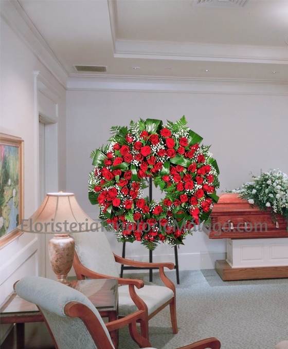 Corona floral funeraria especial de rosas rojas